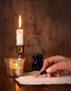 Hand-writing-on-parchment-with-a-golden-pen