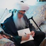 Mawlana Shaykh Nurjan Signing Book Qalam Change Destiny