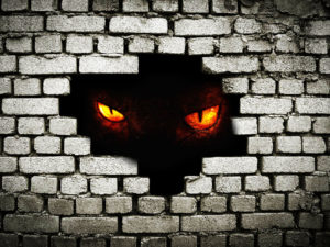 demon behind broken wall