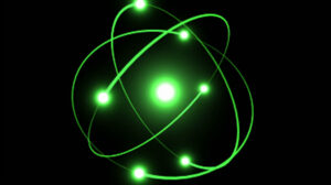 green atoms spin around the nucleus