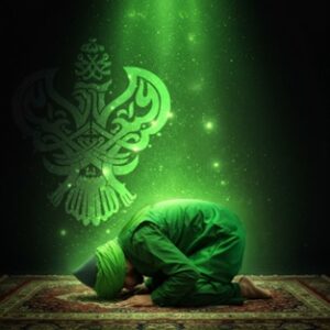 Green lights emanating on man in sujood