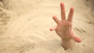 hand-quicksand