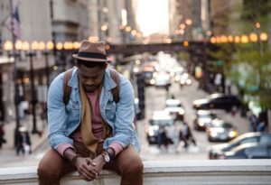 man-contemplation-busy-street