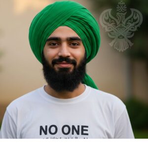 Man smiling wearing NO ONE shirt