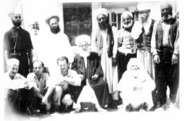 Shaykh Abdullah ad-Dagehestani with murids in Damascus. Shaykh Nazim is to the right of Grandshaykh and Shaykh Hussein is to his left.