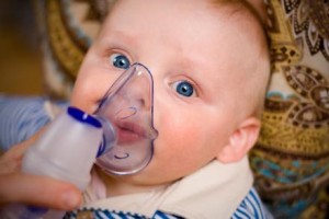 young blue eyed child with asthma